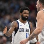 Nov 3, 2024; Dallas, Texas, USA; Dallas Mavericks guard Kyrie Irving (11) comes into the game to replace guard Luka Doncic (77) during the second half against the Orlando Magic at the American Airlines Center. Mandatory Credit: Jerome Miron-Imagn Images