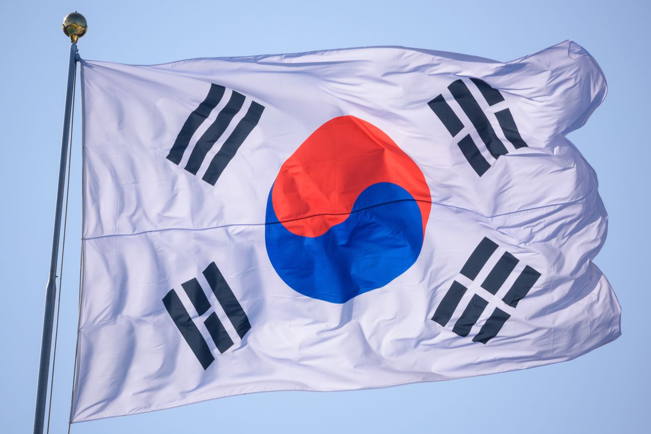 A South Korean flag is flying in the wind at the War...