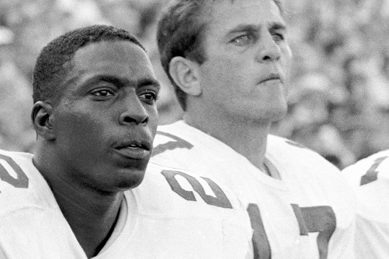 Bob Hayes and Don Meredith Watching Game