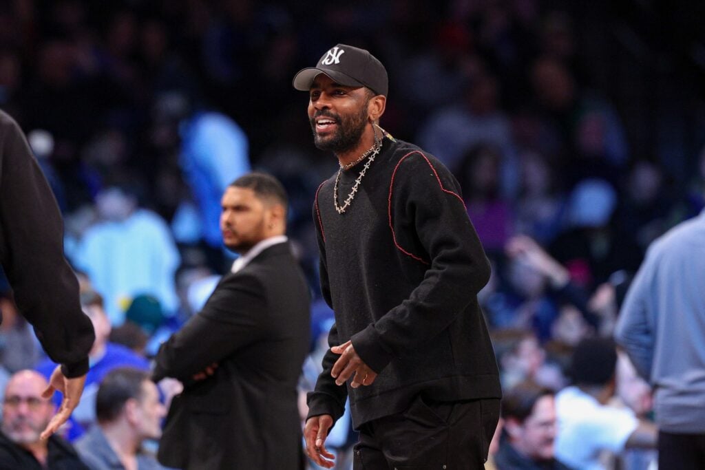 Mar 24, 2025; Brooklyn, New York, USA; Dallas Mavericks guard Kyrie Irving (11) looks on during the first quarter against the Brooklyn Nets at Barclays Center. Mandatory Credit: Vincent Carchietta-Imagn Images